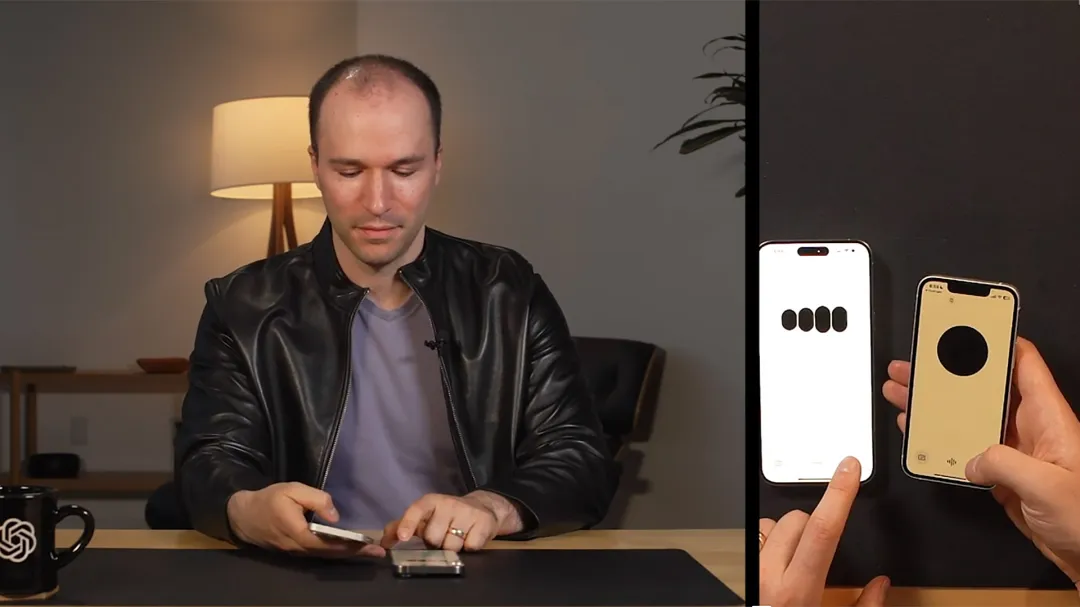 screenshot from video of Greg Brockman using two instances of GPT4o on two phones to collaborate with each other
